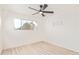 Bright bedroom with ceiling fan and wood-look floors at 3350 W Wethersfield Rd, Phoenix, AZ 85029