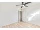Bedroom featuring ceiling fan and wood-look floors at 3350 W Wethersfield Rd, Phoenix, AZ 85029