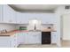 Newly remodeled kitchen with white cabinets and a butcher block countertop at 3350 W Wethersfield Rd, Phoenix, AZ 85029