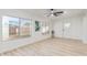 Living room featuring light walls and wood-look floors at 3350 W Wethersfield Rd, Phoenix, AZ 85029