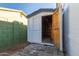 Open storage shed with wooden shelving at 3350 W Wethersfield Rd, Phoenix, AZ 85029