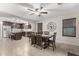 Spacious dining area adjacent to kitchen, featuring a ceiling fan at 37828 N Kyle St, San Tan Valley, AZ 85140