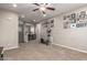 Bright and airy loft with elliptical and wall decor at 6260 S Fresno St, Chandler, AZ 85249