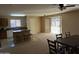 Open concept dining area adjacent to kitchen and living room at 6705 E Flynn Ave, Florence, AZ 85132