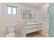 Updated bathroom with double vanity and stylish fixtures at 6802 N 22Nd Pl, Phoenix, AZ 85016