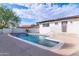 Inviting kidney-shaped pool with concrete decking at 6802 N 22Nd Pl, Phoenix, AZ 85016