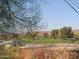 Scenic view of a lush green golf course from a property at 1368 E Victoria View St, Queen Valley, AZ 85118