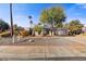 Single story home with desert landscaping at 13850 N 51St St, Scottsdale, AZ 85254