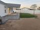 Artificial turf lawn, covered patio, and block wall at 16244 N 27Th Pl, Phoenix, AZ 85032