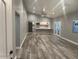 Bright living room with high ceiling and wood-look floors at 16244 N 27Th Pl, Phoenix, AZ 85032