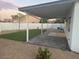 Covered patio and artificial turf backyard at 16244 N 27Th Pl, Phoenix, AZ 85032