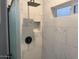 Clean shower with white tiles and modern fixtures at 16244 N 27Th Pl, Phoenix, AZ 85032