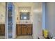 Bathroom with a double vanity and updated fixtures at 18648 N 27Th St, Phoenix, AZ 85050