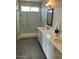 Bathroom with walk-in shower and double vanity at 19111 W Nolan Dr, Buckeye, AZ 85326