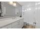 Modern bathroom with white tile shower and quartz countertop at 2161 E Gemini Dr, Tempe, AZ 85283