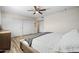 Bright bedroom with double doors and wood-look flooring at 2161 E Gemini Dr, Tempe, AZ 85283