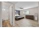 Spacious main bedroom with wood floors and ensuite bathroom at 2161 E Gemini Dr, Tempe, AZ 85283