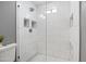 Clean shower with white tile and glass enclosure at 2161 E Gemini Dr, Tempe, AZ 85283