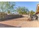 Spacious backyard with patio and desert landscaping at 2255 W Osage Ave, Mesa, AZ 85202