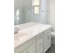 Clean bathroom with white vanity and large mirror at 2550 N 149Th Ave, Goodyear, AZ 85395