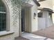 Front entryway with a screen door and walkway at 2550 N 149Th Ave, Goodyear, AZ 85395