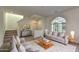 Bright and airy living room with comfortable seating and a large window at 2550 N 149Th Ave, Goodyear, AZ 85395
