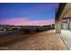 Landscaped backyard, offering sunset mountain views at 256 E Tumbleweed Dr, Phoenix, AZ 85085