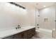 Bathroom with single vanity and tub shower combo at 256 E Tumbleweed Dr, Phoenix, AZ 85085