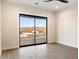 Bright bedroom with sliding glass doors and mountain views at 256 E Tumbleweed Dr, Phoenix, AZ 85085