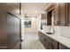 Spacious laundry room with ample cabinetry and countertop space at 256 E Tumbleweed Dr, Phoenix, AZ 85085