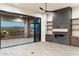 Open living space with sliding doors leading to a patio and mountain views at 256 E Tumbleweed Dr, Phoenix, AZ 85085