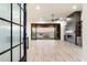 Bright and spacious living room with sliding glass doors, fireplace, and hardwood floors at 256 E Tumbleweed Dr, Phoenix, AZ 85085