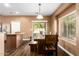 Kitchen with island, stainless steel appliances, and granite counters at 282 E Dry Creek Rd, San Tan Valley, AZ 85143