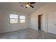 Bedroom with en-suite bathroom and ceiling fan at 3720 N San Carlos Dr, Eloy, AZ 85131