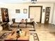 Living room with hardwood floors, a rustic wooden coffee table and a cozy couch at 404 E Paseo De Isabella --, Casa Grande, AZ 85122