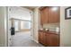 Home hallway featuring built-in cabinets and access to other rooms at 4582 S Wildflower Pl, Chandler, AZ 85248