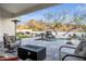 Inviting pool and spa area with a fire pit and mountain backdrop at 4711 E Marston Dr, Paradise Valley, AZ 85253