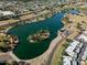 Aerial view of a lake and surrounding neighborhood at 5037 N 83Rd St, Scottsdale, AZ 85250