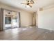 Bedroom with sliding door to patio, ceiling fan and hardwood floors at 5209 E Sierra Sunset Trl, Cave Creek, AZ 85331