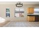 Bright dining area with large windows and chandelier at 5209 E Sierra Sunset Trl, Cave Creek, AZ 85331