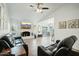 Spacious living room with fireplace and wood-look floors at 5228 W Purdue Ave, Glendale, AZ 85302