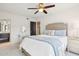 Well-lit bedroom featuring a comfortable bed and ensuite access at 7024 E 6Th St # 103, Scottsdale, AZ 85251