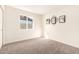 Bedroom featuring a window and wall art at 7309 W Claremont St, Glendale, AZ 85303