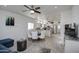 Open concept dining area with a round table and chairs, adjacent to the kitchen at 7750 E Broadway Rd # 523, Mesa, AZ 85208