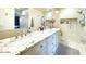 Elegant bathroom with granite countertops and a large shower at 10063 E Cinnabar Ave, Scottsdale, AZ 85258