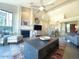 Open living area with fireplace and access to backyard patio at 10063 E Cinnabar Ave, Scottsdale, AZ 85258