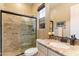 Bathroom with granite countertop, single sink, and shower/tub combo at 10737 E Scopa Trl, Scottsdale, AZ 85262