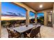 Spacious patio with dining table and chairs, perfect for outdoor meals at 10737 E Scopa Trl, Scottsdale, AZ 85262