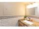 Small bathroom with granite countertop and decorative tile at 1401 E Puget Ave # 24, Phoenix, AZ 85020