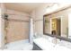 Updated bathroom with a tub, shower, and modern vanity at 1401 E Puget Ave # 24, Phoenix, AZ 85020